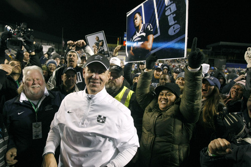 Chris Detrick  |  The Salt Lake Tribune
Utah State Aggies head coach Gary Andersen celebrates with the fans after winning the Famous Idaho Potato Bowl at Bronco Stadium Saturday December 15, 2012.  The Aggies beat the Rockets, 41-15.