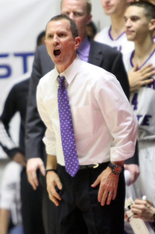 Rick Egan  | The Salt Lake Tribune 

Weber State Wildcats head coach Randy Rahe shouts at the referee, in basketball action, BYU vs. Weber State, in Ogden, Saturday, December 15, 2012.