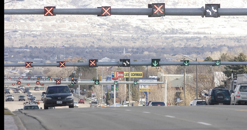 Paul Fraughton  |   The Salt Lake Tribune
Traffic lights on the stretch of 5400 South between Bangerter Highway and 1900 West.
 Monday, December 17, 2012