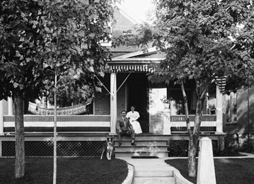 (Photo Courtesy Utah State Historical Society)

Image shows the Harrison couple and their dog, posed for a picture on the front porch or their residence in Salt Lake 14 Aug. 1909.