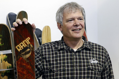 Al Hartmann  |  The Salt Lake Tribune
RAMP Sports founder and president Mike Kilchenstein holds a 2013 "Woodpecker,"  an all-around downhill ski at the company production facility in Park City. RAMP Sports is experiencing impressive growth and extended demand for its hand-crafted skis and snowboards.