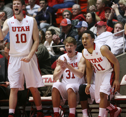 Steve Griffin | The Salt Lake Tribune


The Utah bench leap from the bench as the Utes take a lead late in the second half of their game against at the Huntsman Center in Salt Lake City, Utah Tuesday December 18, 2012.