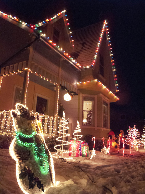(Cimaron Neugebauer | The Salt Lake Tribune) 
Bangerter Homes' full-scale rendition of the house in the movie "Up," located at 13215 S. 5390 West in Herriman is lit for Christmas time. On Dec. 22 Santa Claus will visit the porch of the house for free photos for anyone. Donations are encouraged for a Sub-for-Santa family.
