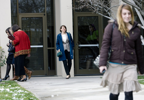 Kim Raff  |  The Salt Lake Tribune
Julia Shumway, center, walks out of an LDS singles ward wearing pants in the Avenues neighborhood of Salt Lake City on December 16, 2012. Shumway was participating in the Wear Pants to Church Day, a movement that hopes to bring a dialog about women's role within the church.