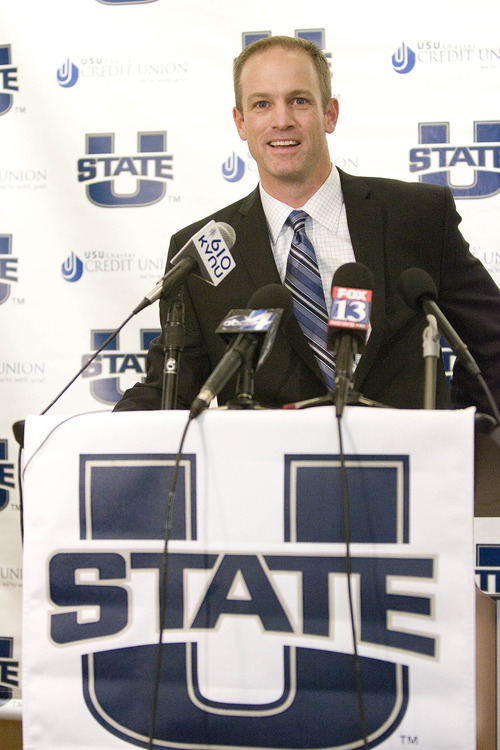 Paul Fraughton  |   Salt Lake Tribune
Matt Wells speaking at a press conference in Logan where  he was introduced as Utah State's new head football coach.
 Thursday, December 20, 2012