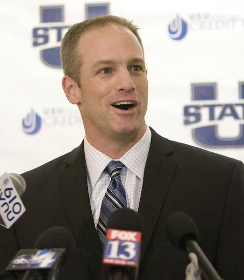 Paul Fraughton  |   The Salt Lake Tribune
Matt Wells speaks at a press conference in Logan on Thursday where  he was introduced as Utah State's new head football coach.