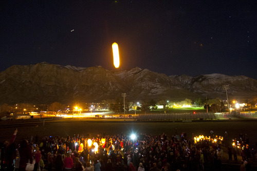 Chris Detrick  |  The Salt Lake Tribune
Lanterns were lit and launched from the nearby football field - one for each Newtown victim - after a public service honoring Emilie Parker at Ben Lomond High School in Ogden Thursday December 20, 2012.  Emilie was killed in last week's Sandy Hook Elementary School shooting.