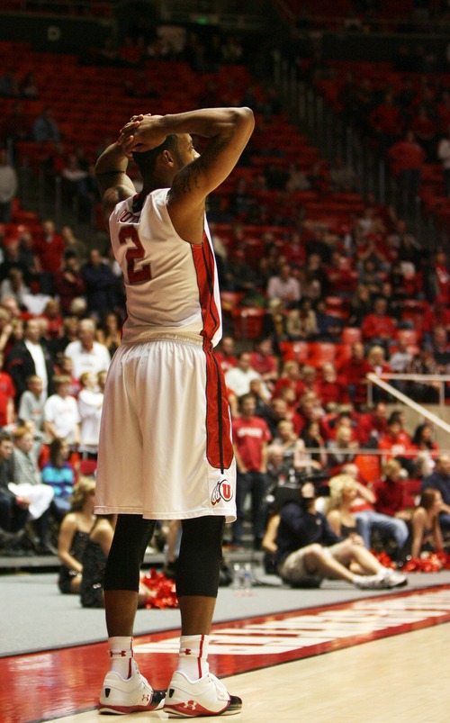 Kim Raff  |  The Salt Lake Tribune
University of Utah guard/forward Aaron Dotson (2) reacts to Cal State Northridge's comeback late in the fourth quarter during a game at the Huntsman Center in Salt Lake City on December 21, 2012.