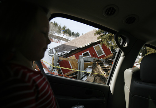 Scott Sommerdorf  |  The Salt Lake Tribune              
From the back seat of the family car, seven year old Avery Holt looks at the historic house built in the late 1800's resting off it's foundation at 335 Woodside Ave., in Park City, Sunday, December 23, 2012.