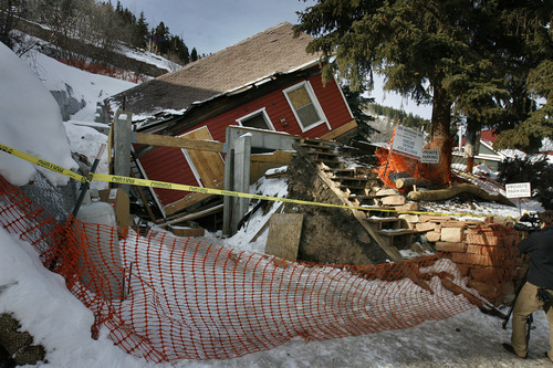 Scott Sommerdorf  |  The Salt Lake Tribune              
The historic house built in the late 1800's came to rest off it's foundation at 335 Woodside Ave., in Park City, Sunday, December 23, 2012.