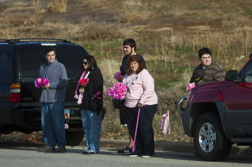 Chris Detrick  |  The Salt Lake Tribune
Supporters on the sidewalk along Monroe Blvd, as they wait for Emilie Parker's hearse to pass on the way to Myers Evergreen Memorial Park Saturday December 22, 2012.  Emilie Parker, 6, was one of 20 children massacred by a gunman Dec. 14 at Sandy Hook Elementary School in Newtown, Conn.