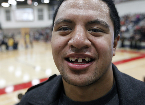 Al Hartmann  |  The Salt Lake Tribune
Herriman High School basketball player sang "All I Want for Christmas"  (is my two front teeth),  during Hearts of Gold closing assembly on Friday December 21. He raised $500 for charity being the good sport he is.   He had his teeth knocked out in a game last week.   The assembly celebrated the season charity drive with everything from a dodge ball championship match to dances and student body skits. Through prior student donations and today's assembly the school raised $30,012,56 for charity.