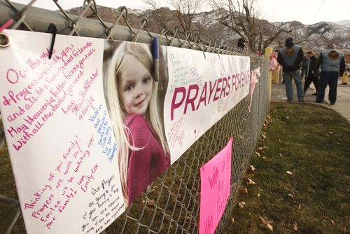Leah Hogsten  |  The Salt Lake Tribune
Messages line the funeral parade route Saturday December 22, 2012 in Ogden. Funeral services for Connecticut elementary shooting victim Emilie Parker were held in Ogden at the at the Rock Cliff LDS Stake Center. Emilie, whose family has Ogden roots, was one of 20 children and six adult victims killed in the Dec. 14 mass shooting at Sandy Hook Elementary in Newtown, Conn. The shooting took the lives of 26 people, before the gunman killed himself.