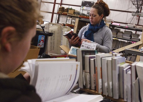 Leah Hogsten  |  The Salt Lake Tribune
Campus Book Rentals warehouse associates Balee Jacobsen (left) and Brooke Lilley check books back into the system while working the receiving line Wednesday December 26, 2012 in Ogden. Campus Book Rentals.com is one of nine Utah companies to be recognized with Inc. magazine's Hire Power award for creating the most jobs over the past three years.