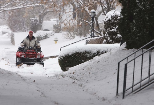 Leah Hogsten  |  The Salt Lake Tribune
"This is nothing," said Travis Wardell of Ogden of the amount of snow that fell on the city while plowing his street Wednesday December 26, 2012. Wardell moved to Utah this year from Helena, Montana.