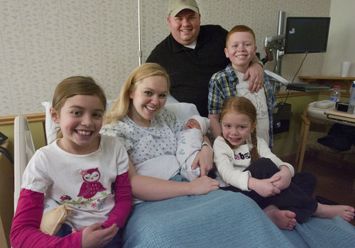 Steve Griffin | The Salt Lake Tribune

Dan and Angie Call with their newborn son, Jackson, and their daughters Natalie, 8, Kaylee, 5, and son, Josh, 11, at Altaview Hospital in Sandy, Utah Friday December 21, 2012.