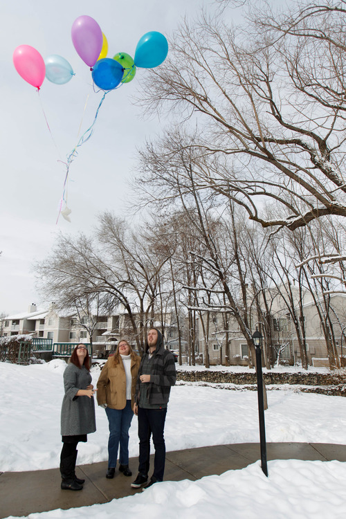 Trent Nelson  |  The Salt Lake Tribune
Stephanie Cook, left, releases balloons on Thursday in Cottonwood Heights to mark the day her mother, Bobbi Campbell, disappeared 18 years ago. With Cook is Rebecca Storrs and Cook's husband Trevin Cook.