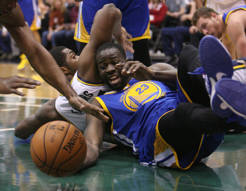 Steve Griffin | The Salt Lake Tribune


Utah's Derrick Favors and Golden State's Draymond Green scramble for the ball during first half action of the Utah Jazz Versus Golden State Warriors game at EnergySolutions Arena in Salt Lake City, Utah Wednesday December 26, 2012.