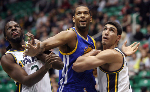 Steve Griffin | The Salt Lake Tribune


Utah's DeMarre Carroll and Enes Kanter box out Golden State's Jeremy Tyler during second half action of the Utah Jazz Versus Golden State Warriors game at EnergySolutions Arena in Salt Lake City, Utah Wednesday December 26, 2012.
