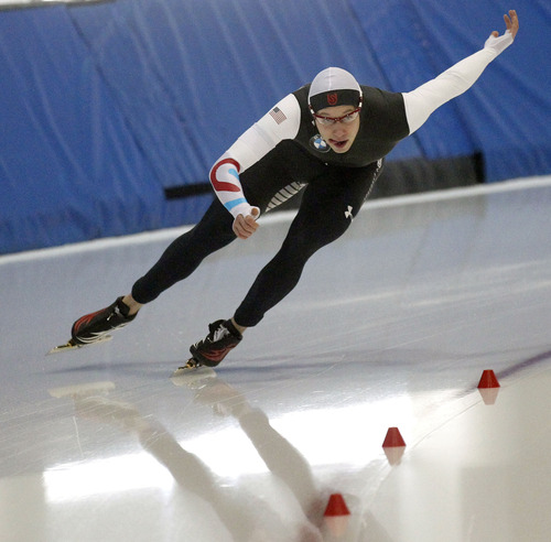 Al Hartmann  |  The Salt Lake Tribune
Jonathan Garcia skates through the final turn in the 500-meter race at the  U.S. Long-Track Speedskating Championships at the Utah Olympic Oval in Kearns Friday, Dec. 28.  He took fourth place in the event.