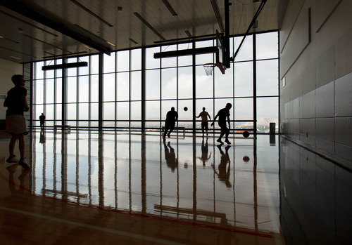 Trent Nelson  |  The Salt Lake Tribune
Employees play basketball at the new Adobe building Thursday December 6, 2012 in Lehi.