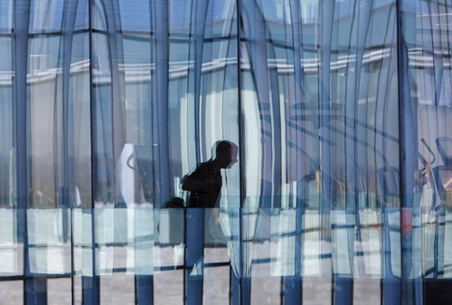 Trent Nelson  |  The Salt Lake Tribune
Reflections in the windows of the exercise room at the new Adobe building Thursday December 6, 2012 in Lehi.