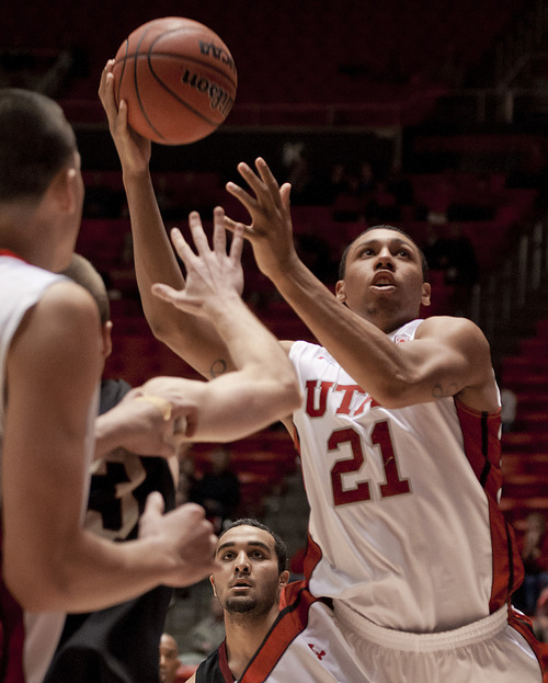 Michael Mangum  |  Special to the Tribune

Utah forward Jordan Loveridge (21) drives for a layup during their game against the Willamette Bearcats at the Huntsman Center on Friday, November 9, 2012. Loveridge led the team with 10 rebounds and 18 points as the Utes beat the Bearcats 104-47.