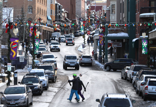 Rick Egan  |  The Salt Lake Tribune
Skiers cross Main Street in Park CIty, Friday, December 28, 2012.