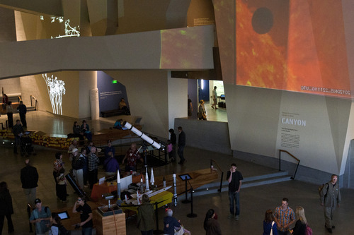 Chris Detrick  |  The Salt Lake Tribune
Visitors watch a projected image of the transit of Venus at the Natural History Museum of Utah Tuesday June 5, 2012. The last time such an event was viewable from Utah was 1882; it won't be seen again from the Beehive State until 2125, decades after even Halley's Comet will have come and gone again.