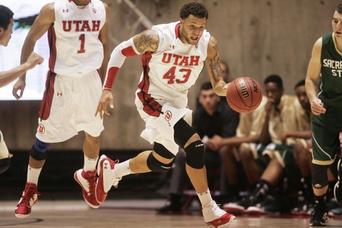 Kim Raff  |  The Salt Lake Tribune
University of Utah player Cedric Martin dribbles the ball down the court against Sacramento State during a men's basketball game at the Huntsman Center in Salt Lake City on November 16, 2012. They went on to lose the game 71-74.