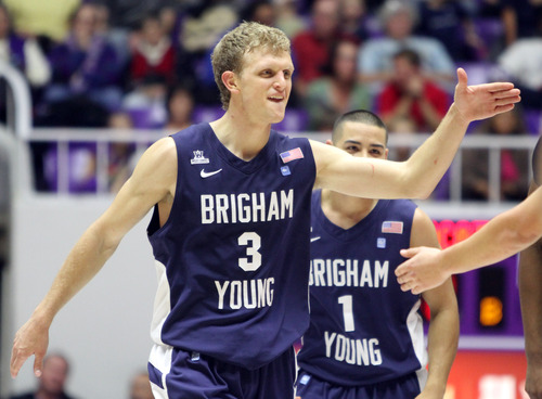 Rick Egan  | The Salt Lake Tribune 

Brigham Young Cougars guard Tyler Haws (3) celebrates after BYU goes up by 15 late in the game, in basketball action, BYU vs. Weber State, in Ogden, Saturday, December 15, 2012.