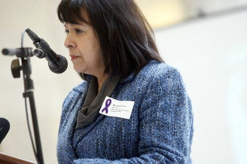 Chris Detrick  |  The Salt Lake Tribune
Domestic abuse survivor Brandy Farmer speaks during a ceremony by the Utah Domestic Violence Council in the Utah State Capitol rotunda Wednesday January 2, 2013.  They were remembering all of the victims of domestic violence-related deaths in the past year.