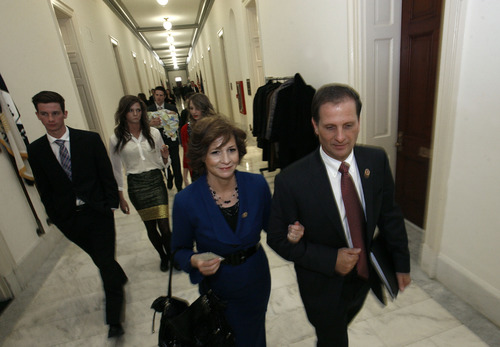 Scott Sommerdorf  |  The Salt Lake Tribune
Congressman-elect Chris Stewart, R-Utah, and his wife, Evie, and family walk through the hallways of the Capitol building on their way to Stewart's swearing-in, Thursday, Jan. 3, 2013.