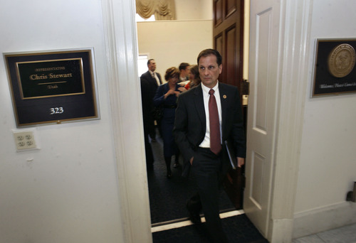 Scott Sommerdorf   |  The Salt Lake Tribune
Congressman-elect Chris Stewart, R-Utah, leaves his new offices on his way to his swearing-in, Thursday, Jan. 3, 2013.