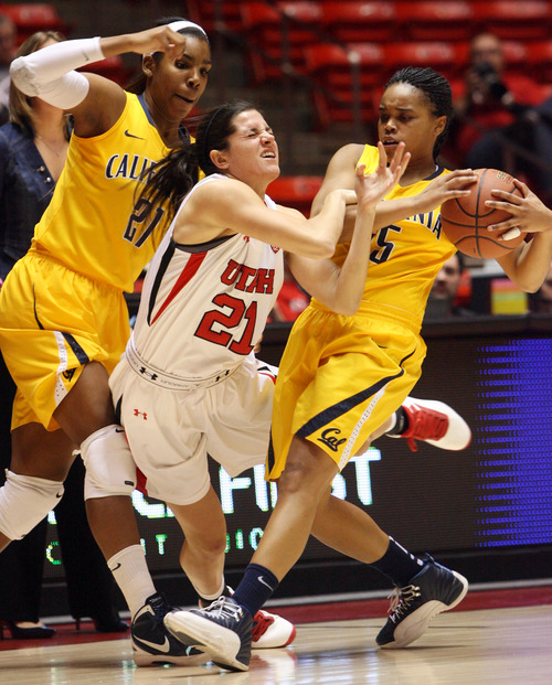 Kim Raff | The Salt Lake Tribune
(middle) University of Utah player Chelsea Bridgewater reacts as (right) California players Brittany Boyd and (left) Reshanda Gray cause a turnover during a game at the Huntsman Center in Salt Lake City on January 4, 2013.