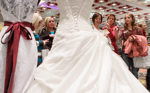 Trent Nelson  |  The Salt Lake Tribune
Dresses by Bridal Image on display at the Bridal Showcase Saturday January 5, 2013 at the Salt Palace Convention Center in Salt Lake City.