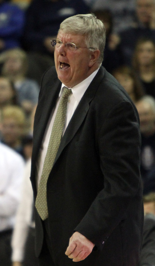 Rick Egan  | The Salt Lake Tribune 

Utah State Aggies head coach Stew Morrill disputes a call by the referee, in basketball action Utah State vs. The Idaho Vandals,  in Logan, Saturday, January 5, 2013.