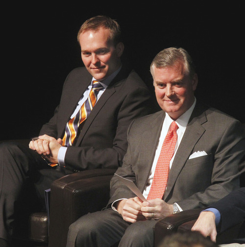Al Hartmann  |  The Salt Lake Tribune
Incoming Salt Lake County Mayor Ben Mcadams, left, and outgoing Mayor Peter Corroon sit together and watch members of the Salt Lake County Council take their oaths of office at the Rose Wagner Theatre Monday January 7.