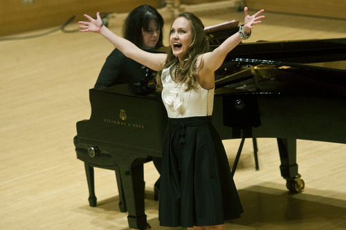Chris Detrick  |  The Salt Lake Tribune
Soprano Abigail Dueppen, 27, sings Bernstein's "Glitter and Be Gay" from "Candide" at Libby Gardner Concert Hall Saturday January 5, 2013. Twenty-eight young singers auditioned for a spot with the prestigious Metropolitan Opera during regional auditions.