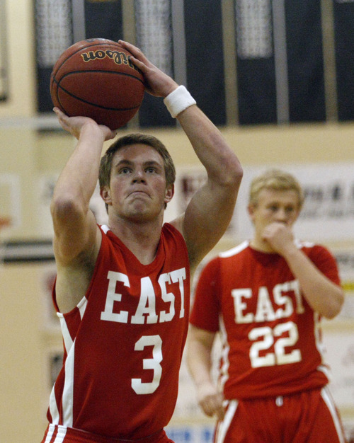 Chris Detrick  |  The Salt Lake Tribune
East's Preston Curtis (3) shoots a free throw during the game at Roy High School Friday January 4, 2013.