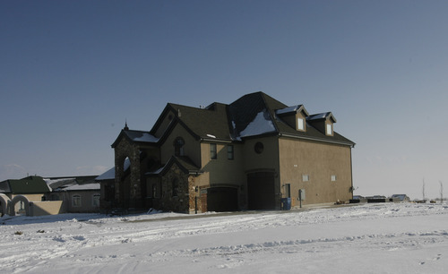 Rick Egan  | The Salt Lake Tribune 

A developer plans to build high-density rental homes near this big single-family home, in a subdivision in Saratoga Springs, Thursday, Jan. 3, 2013. Residents in Saratoga Springs are suing the city and have a referendum to stop the development.