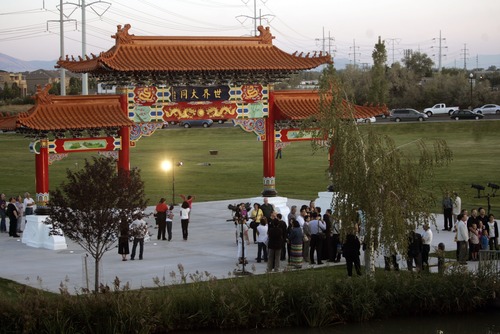 Kim Raff  |  The Salt Lake Tribune
People walk around the Chinese Heritage Gate after the unveiling at the Utah Cultural Center in West Valley City, Utah on September 29, 2012. The gate, which is a symbol of friendship between West Valley City and Nantou, Taiwan, has come under scrutiny with some members of the Asian community who are upset about how funds for the gate have been handled.