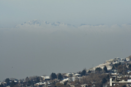 Chris Detrick  |  The Salt Lake Tribune
Antelope island though the inversion over the Salt Lake Valley as seen from the Utah Museum of Natural History Wednesday January 9, 2013.