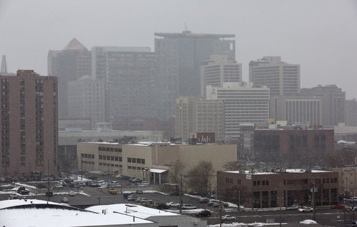 Lennie Mahler  |  The Salt Lake Tribune
A snowstorm blows in over the Salt Lake City skyline Thursday, Jan. 10, 2013.