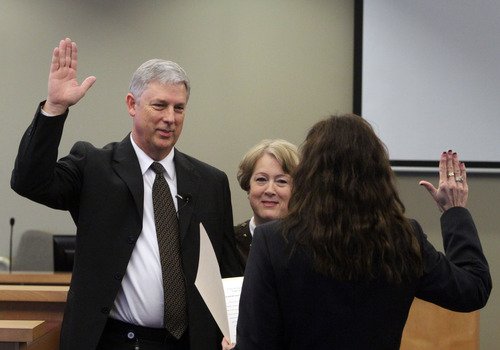 Rick Egan  |  The Salt Lake Tribune 
Jerry Rechtenbach, the new Taylorsville mayor, was sworn in to office Thursday by City Recorder Cheryl Peacock Cottle.