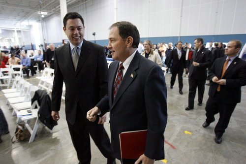 Francisco Kjolseth  |  The Salt Lake Tribune
Congressman Jason Chaffetz, left, and Gov. Gary Herbert participate in the celebration of Boeing opening of a new manufacturing plant in West Jordan on Friday, January 11, 2013. The company says the factory will create more capacity to meet increasing production rates after purchasing the 850,000-square-foot former Kraft building at 10026 Prosperity Road.