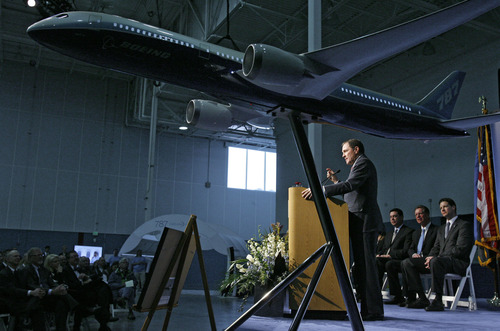 Francisco Kjolseth  |  The Salt Lake Tribune
Gov. Gary Herbert joins the festivities as Boeing celebrates the opening of a new manufacturing plant in West Jordan on Friday, January 11, 2013. The company says the factory will create more capacity to meet increasing production rates after purchasing the 850,000-square-foot former Kraft building at 10026 Prosperity Road.