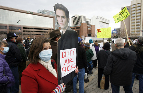 Francisco Kjolseth  |  The Salt Lake Tribune
Cherise Udell with Utah Moms for Clean Air uses a cutout of the vampire Edward to make her point as she joins environmentalists staging a clean-energy rally outside the Calvin L. Rampton Salt Palace Convention Center, where the governor was hosting his Energy Development Summit.