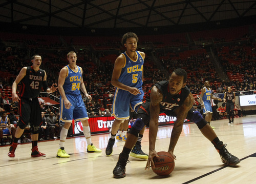 Chris Detrick  |  The Salt Lake Tribune
Utah Utes guard Aaron Dotson (2) is guarded by UCLA Bruins guard Kyle Anderson (5) during the first half of the game at the Huntsman Center Thursday January 10, 2013.
