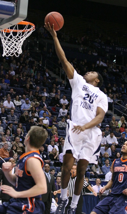 Paul Fraughton  |   Salt Lake Tribune
BYU's Anson Winder  lays the ball into the basket.BYU played The Pepperdine Waves at BYU's Marriott Center.
 Thursday, January 10, 2013